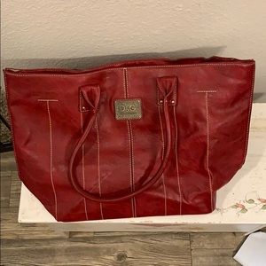 Red Dolce tote bag with cream stitching